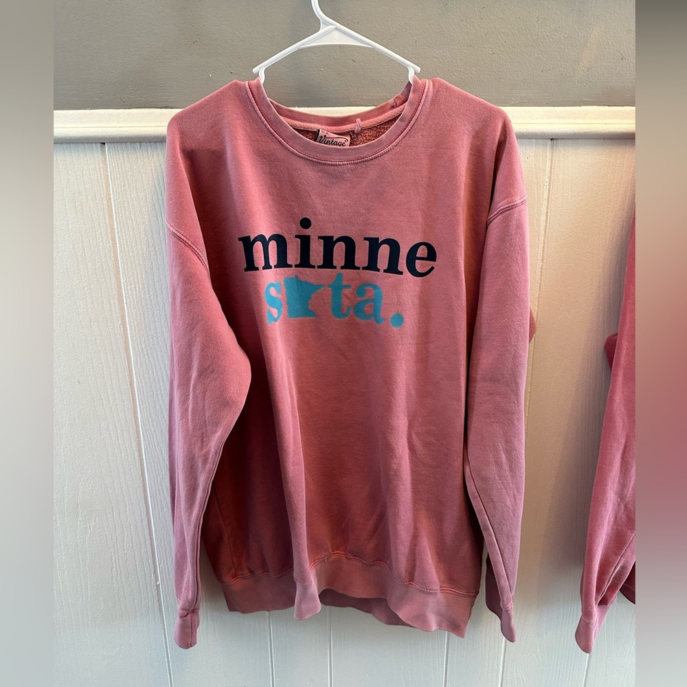 This is a salmon-ish crewneck, from a store in Duluth, MN, bought for $45